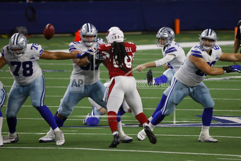 Ron Jenkins Arizona Cardinals' De'Vondre Campbell (59) rushes as Dallas Cowboys place kicker Greg Zuerlein (2) attempts a field goal in the second half of an NFL football game in Arlington, Texas, Monday, Oct. 19, 2020. The attempt was no good. (AP Photo/Ron Jenkins)