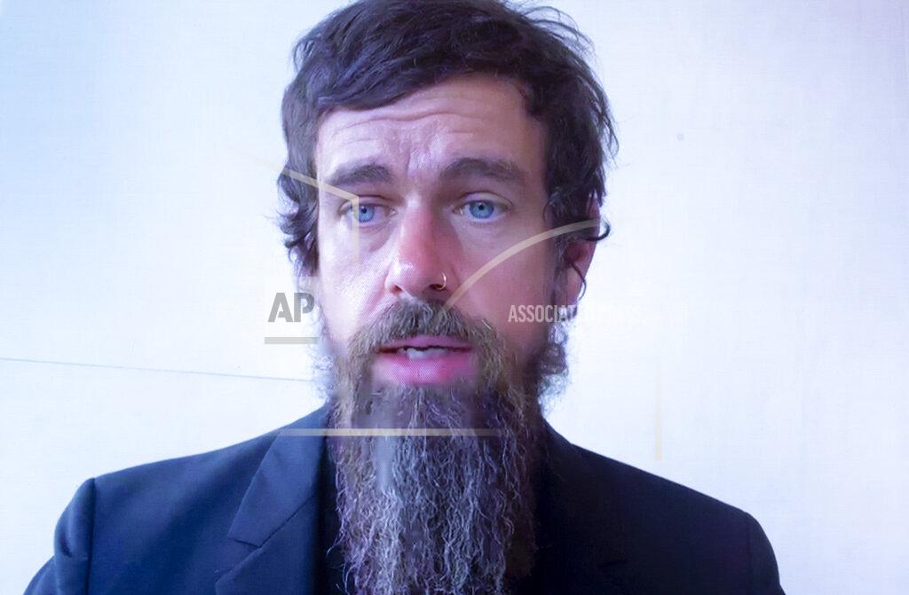 Michael Reynolds FILE - In this Wednesday, Oct. 28, 2020, file photo, Twitter CEO Jack Dorsey appears on a screen as he speaks remotely during a hearing before the Senate Commerce Committee on Capitol Hill, in Washington. Dorsey broke his silence to defend his company’s ban of President Donald Trump as the right decision, but warned that it could set a dangerous precedent. The ban, he said, revealed Twitter’s “failure” to create an open and healthy space for what Dorsey calls the “global public conversation.” (Michael Reynolds/Pool Photo via AP, File)
