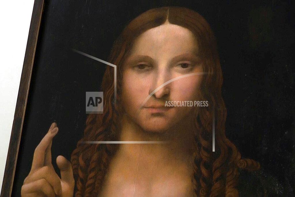 Sicomunicazione A view of a copy of the “Salvator Mundi” (Savior of the World), by Leonardo da Vinci, that was recovered and shown during a press conference at the police headquarters in Naples, Italy, Wednesday, Jan. 20, 2021. Italian police have recovered a copy of Leonardo da Vinci’s 16th century “Salvator Mundi” painting of Jesus Christ that was stolen from a Naples church without the priests even realizing it was gone. The discovery was made over the weekend when Naples police working on a bigger operation found the painting hidden in an apartment. Police chief Alfredo Fabbrocini said the owner offered a “less than credible” explanation that he had “casually” bought it at a small market. (AP Photo/Sicomunicazione)