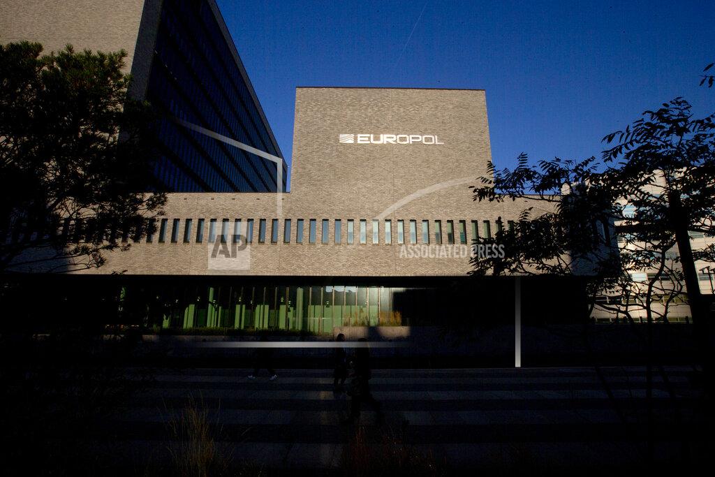 FILE - In this file photo dated Wednesday, Oct. 10, 2018, the Europol headquarters building in The Hague, Netherlands. European Europol and North American cyber cops have joined forces Wednesday Jan. 27, 2021, to disrupt what may be the world's largest network for seeding malware infections, striking a major blow against criminal gangs that have been using it for years to install ransomware in extortion schemes, steal data and engage in financial theft.(AP Photo/Peter Dejong, FILE)