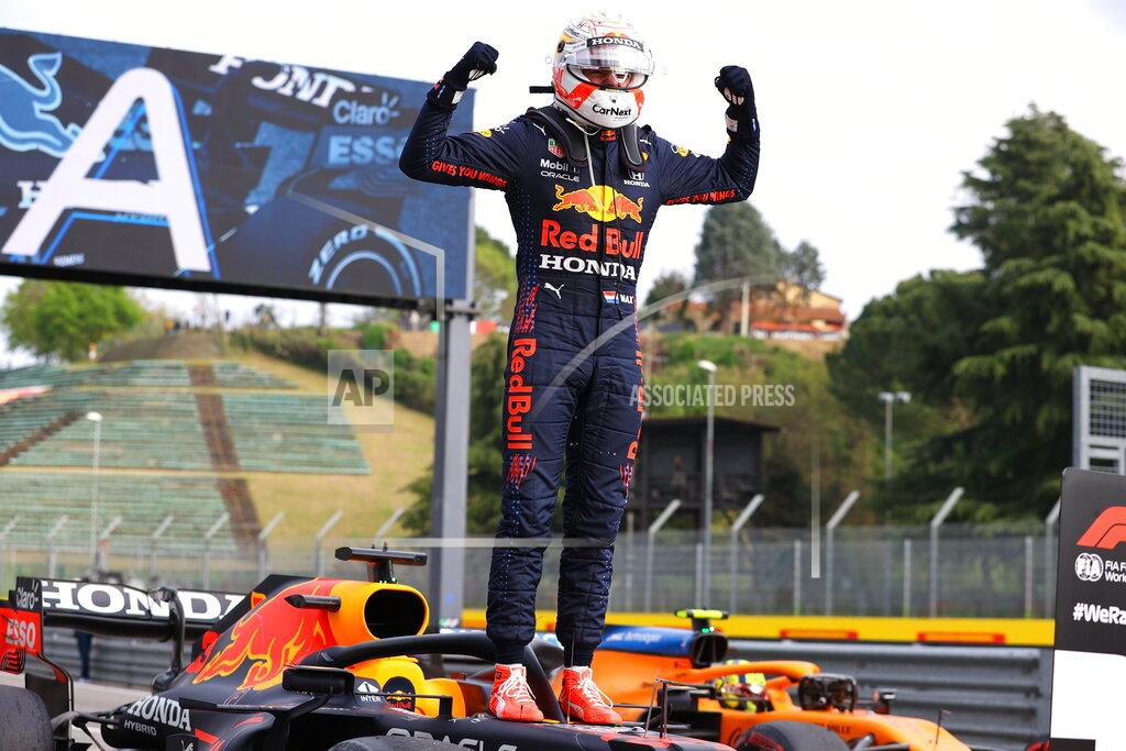 Bryn Lennon First placed Red Bull's Max Verstappen celebrates at the end of the Emilia Romagna Formula One Grand Prix, at the Imola racetrack, Italy, Sunday, April 18, 2021. (Bryn Lennon/ Pool Via AP)