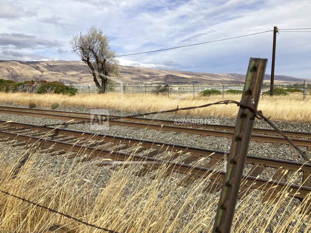 Andrew Selsky This Tuesday, Oct. 5, 2021, photo, shows the land beyond the fending where Google wants to build more data centers at the site of a former aluminum smelter in The Dalles, Oregon. The Dalles City Council member Long-Curtiss wants to know more details about Google's proposal to build more data centers in the town before the city council votes on the matter. As demand for cloud computing grows, the world's biggest tech companies are building more data centers, including in arid regions even though they use vast amounts of water per day. Some residents of The Dalles, Oregon, are objecting to a proposal by Google to build more data centers there, fearing that, amid rising temperatures and drought, there won't be enough water for everyone. (AP Photo/Andrew Selsky)