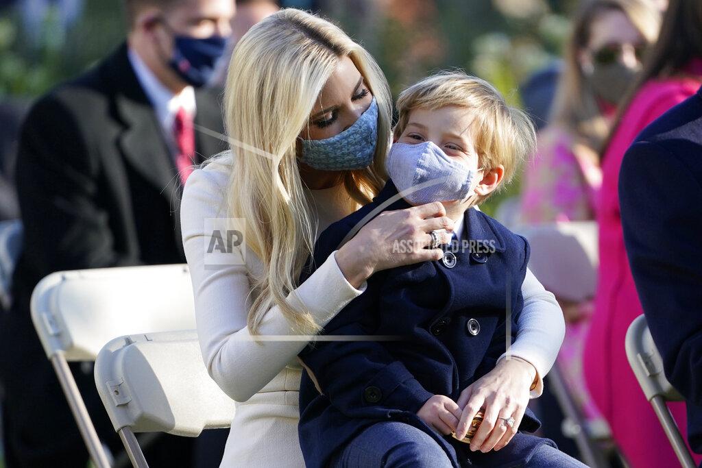 Susan Walsh Ivanka Trump, Assistant to the President, sits with her son Theodore Kushner, as they wait for President Donald Trump to pardon Corn, the national Thanksgiving turkey, in the Rose Garden of the White House, Tuesday, Nov. 24, 2020, in Washington. (AP Photo/Susan Walsh)