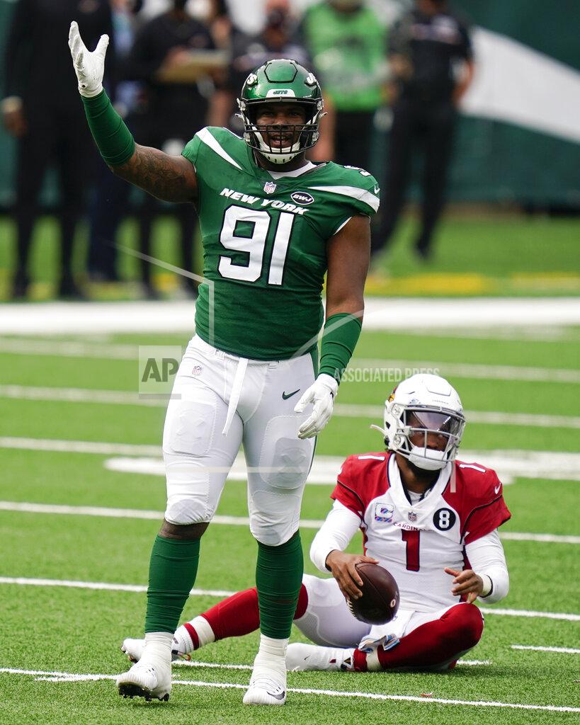 Seth Wenig New York Jets defensive end John Franklin-Myers (91) reacts after sacking Arizona Cardinals quarterback Kyler Murray (1) during the second half of an NFL football game, Sunday, Oct. 11, 2020, in East Rutherford. (AP Photo/Seth Wenig)