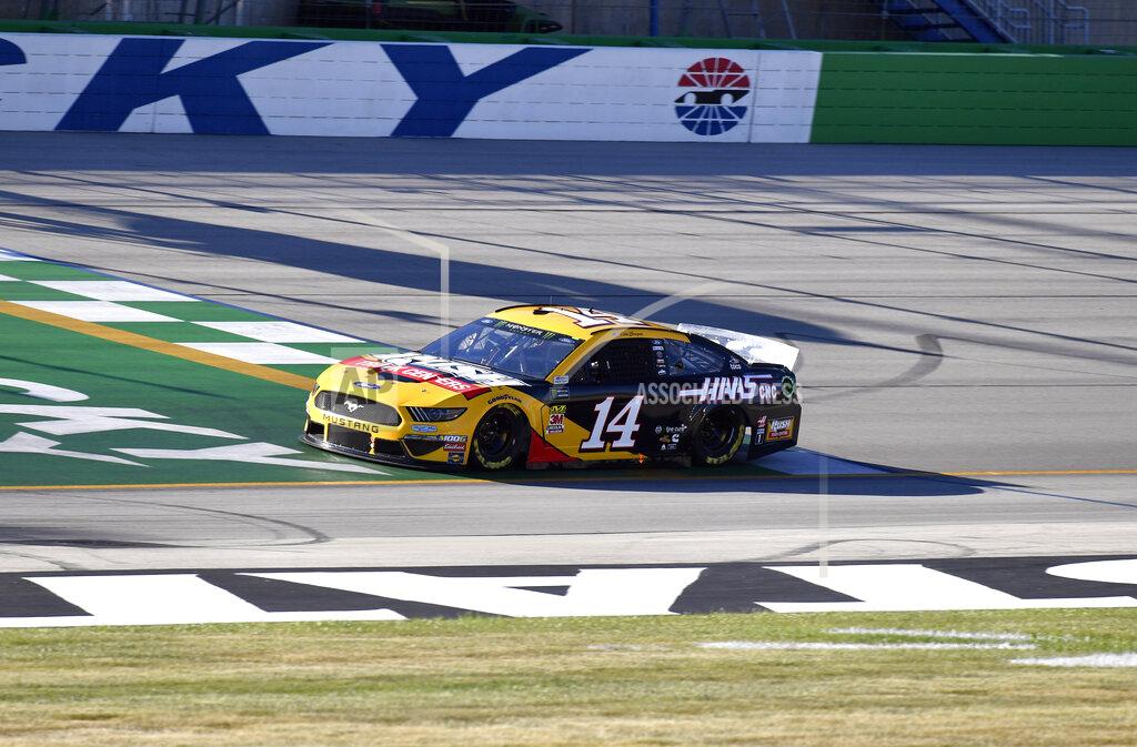 Timothy D. Easley Clint Bowyer crosses the line during qualifying for the NASCAR series auto race at Kentucky Speedway in Sparta, Ky., Friday, July 12, 2019. (AP Photo/Timothy D. Easley)