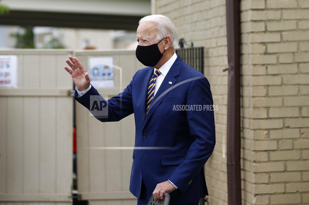 Matt Slocum Democratic presidential candidate, former Vice President Joe Biden waves as he arrives to meet with with small business owners, Wednesday, June 17, 2020, at Carlette's Hideaway, a soul food restaurant, in Yeadon, Pa. (AP Photo/Matt Slocum)