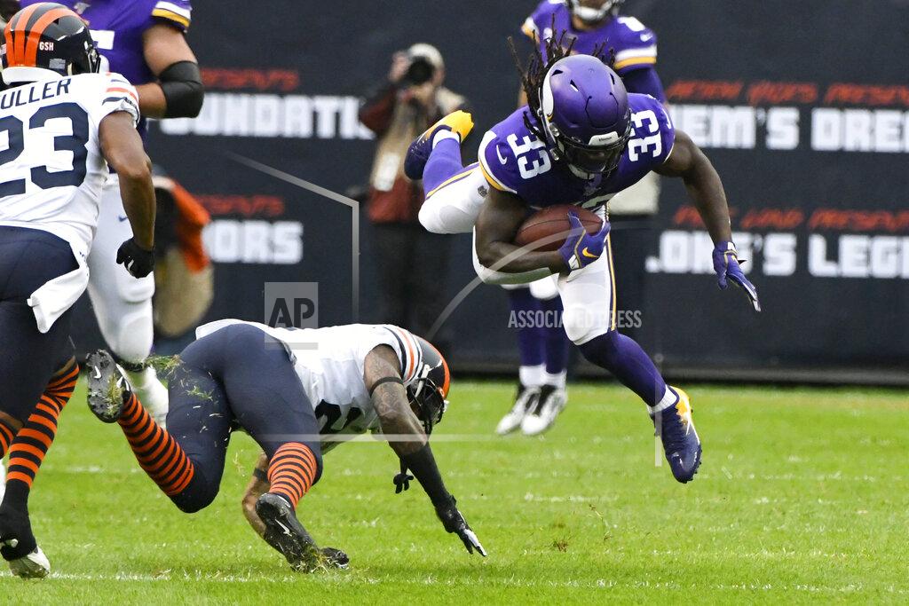Matt Marton Minnesota Vikings running back Dalvin Cook (33) is upended by Chicago Bears strong safety Ha Ha Clinton-Dix, left, after catching a pass during the half of an NFL football game Sunday, Sept. 29, 2019, in Chicago. (AP Photo/Matt Marton)