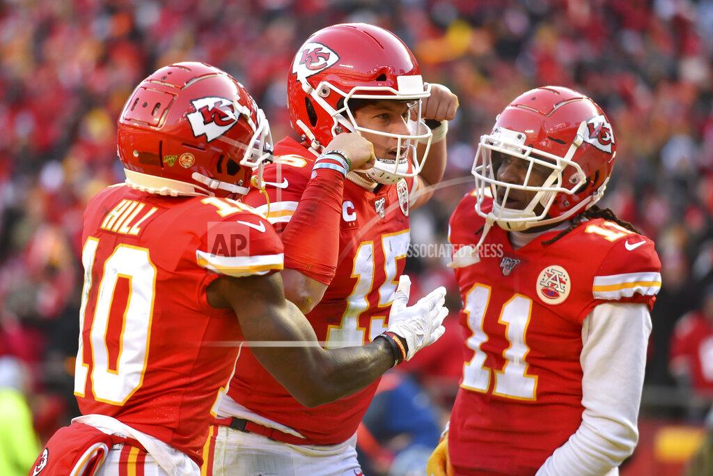 Ed Zurga Kansas City Chiefs' Patrick Mahomes (15) celebrates with Tyreek Hill (10) and Demarcus Robinson after running for a touchdown during the first half of the NFL AFC Championship football game against the Tennessee Titans Sunday, Jan. 19, 2020, in Kansas City, MO. (AP Photo/Ed Zurga)