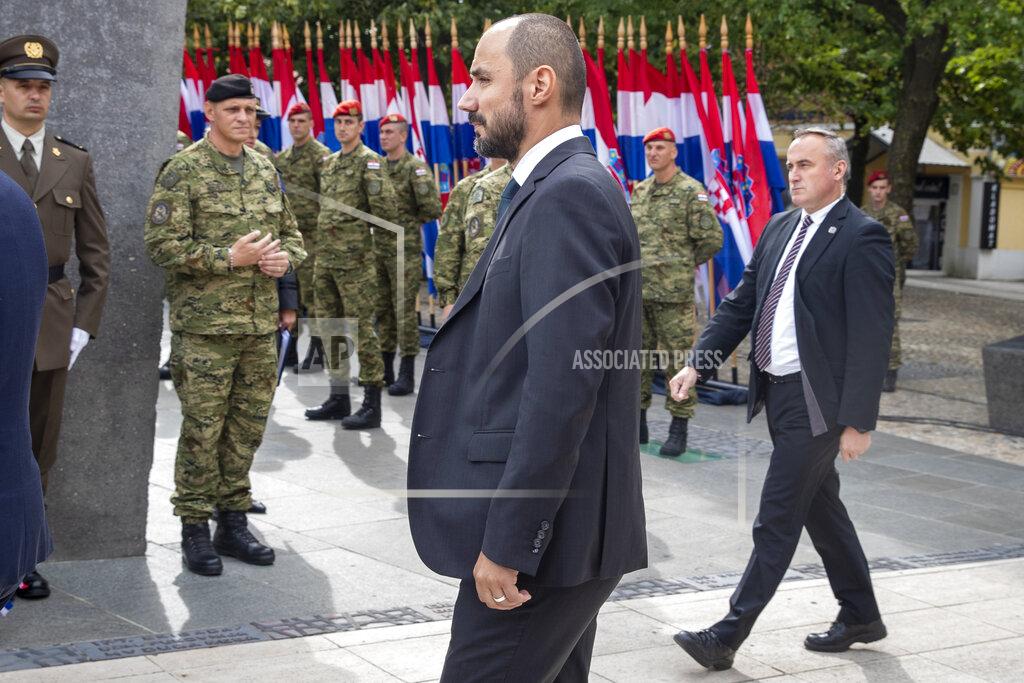 Darko Bandic Croatia's Deputy Prime Minister Boris Milosevic arrives at a ceremony in Knin, Croatia, Wednesday, Aug. 5, 2020. Croatia marked the 25th anniversary of a victorious wartime military offensive, with an ethnic Serb politician attending the ceremony for the first time in what is seen as an important step toward reconciliation. (AP Photo/Darko Bandic)