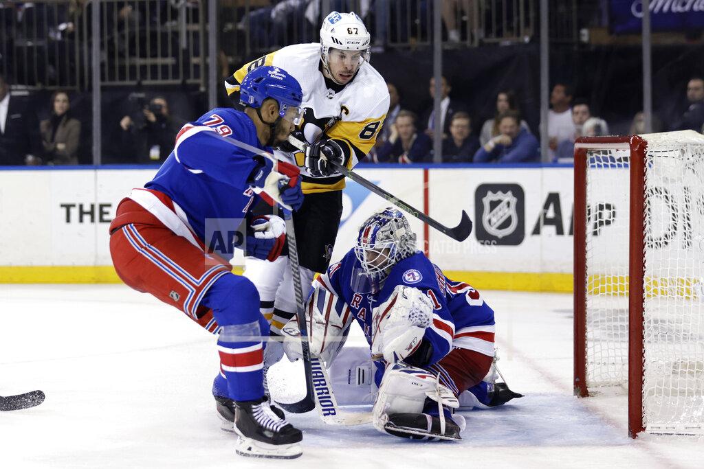 Adam Hunger New York Rangers goaltender Igor Shesterkin stops a shot by Pittsburgh Penguins center Sidney Crosby (87) during the third period in Game 7 of an NHL hockey Stanley Cup first-round playoff series, Sunday, May 15, 2022, in New York. (AP Photo/Adam Hunger)