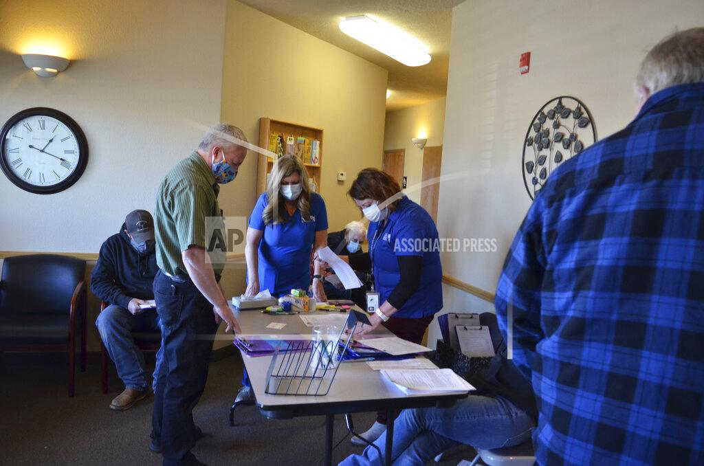 Lexi Peery Garfield County residents gathered in Panguitch, Utah, in hopes of getting a vaccine on Jan. 11, 2021. The coronavirus pandemic has swept through this part of rural Utah, infecting more than one in every dozen people. (Lexi Peery/KUER via AP)