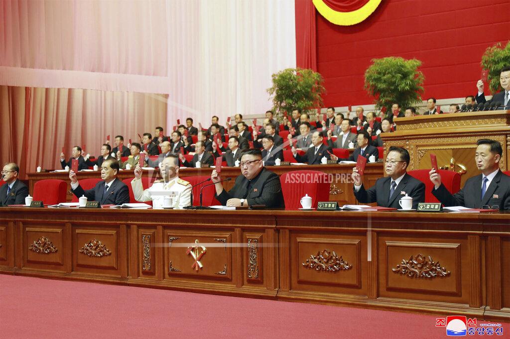 Uncredited In this photo provided by the North Korean government, North Korean leader Kim Jong Un, center, attends the ruling party congress in Pyongyang, North Korean, Sunday, Jan. 10, 2021. Kim was given a new title, “general secretary” of the ruling Workers’ Party, formerly held by his late father and grandfather, state media reported Monday, Jan. 11, in what appears to a symbolic move aimed at bolstering his authority amid growing economic challenges. Independent journalists were not given access to cover the event depicted in this image distributed by the North Korean government. The content of this image is as provided and cannot be independently verified. Korean language watermark on image as provided by source reads: "KCNA" which is the abbreviation for Korean Central News Agency. (Korean Central News Agency/Korea News Service via AP)
