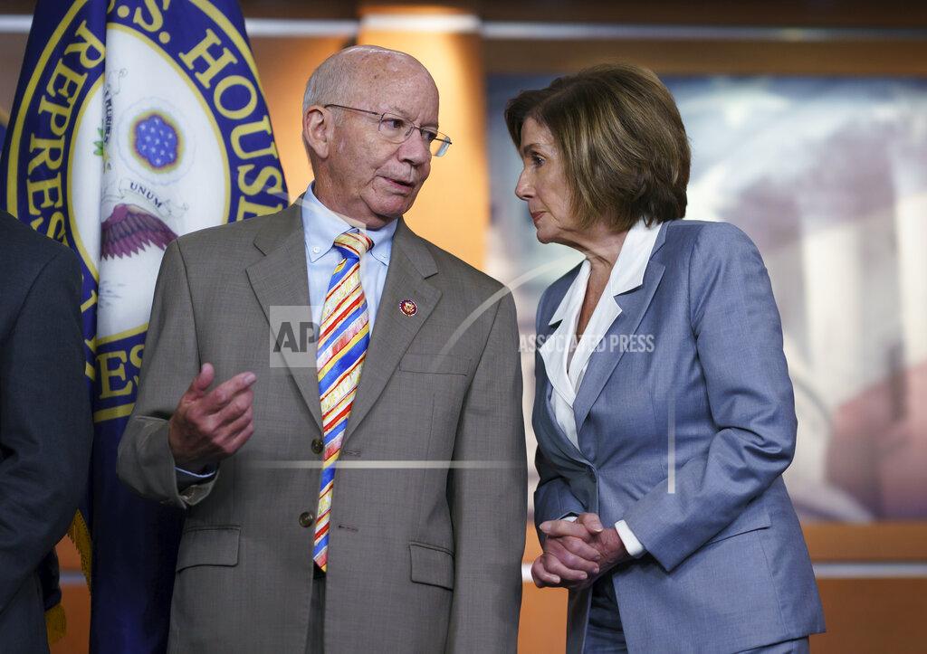 J. Scott Applewhite House Transportation and Infrastructure Committee Chair Peter DeFazio, D-Ore., left, talks to Speaker of the House Nancy Pelosi, D-Calif., during a news conference to discuss the "INVEST in America Act," a five-year surface transportation bill, which directs federal investments in roads, bridges, transit, and rail, at the Capitol in Washington, Wednesday, June 30, 2021. (AP Photo/J. Scott Applewhite)