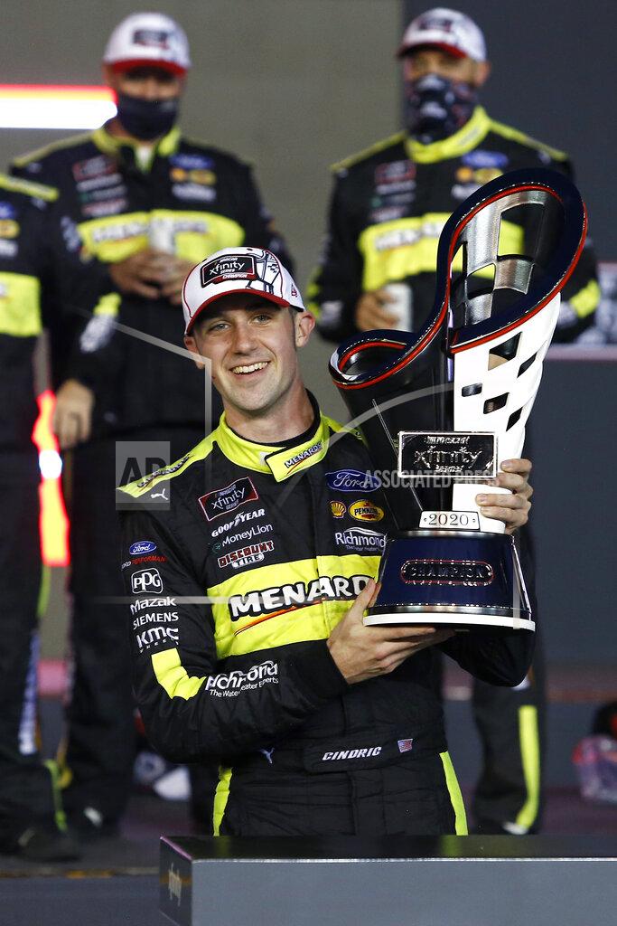 Ralph Freso Austin Cindric holds the season championship trophy in Victory Lane after winning the NASCAR Xfinity Series auto race at Phoenix Raceway, Saturday, Nov. 7, 2020, in Avondale, Ariz. (AP Photo/Ralph Freso)