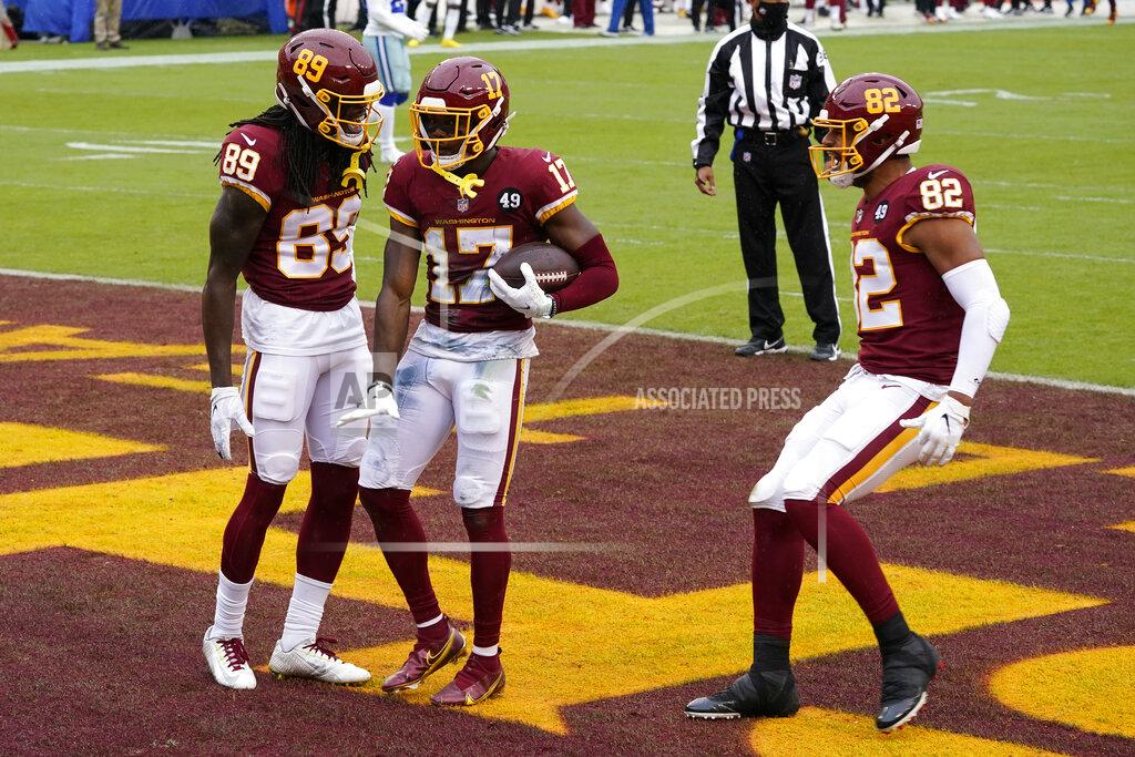 Patrick Semansky Washington Football Team wide receiver Terry McLaurin (17) celebrates his touchdown with teammates wide receiver Cam Sims (89) and tight end Logan Thomas (82) in the first half of an NFL football game against Dallas Cowboys, Sunday, Oct. 25, 2020, in Landover, Md. (AP Photo/Patrick Semansky)