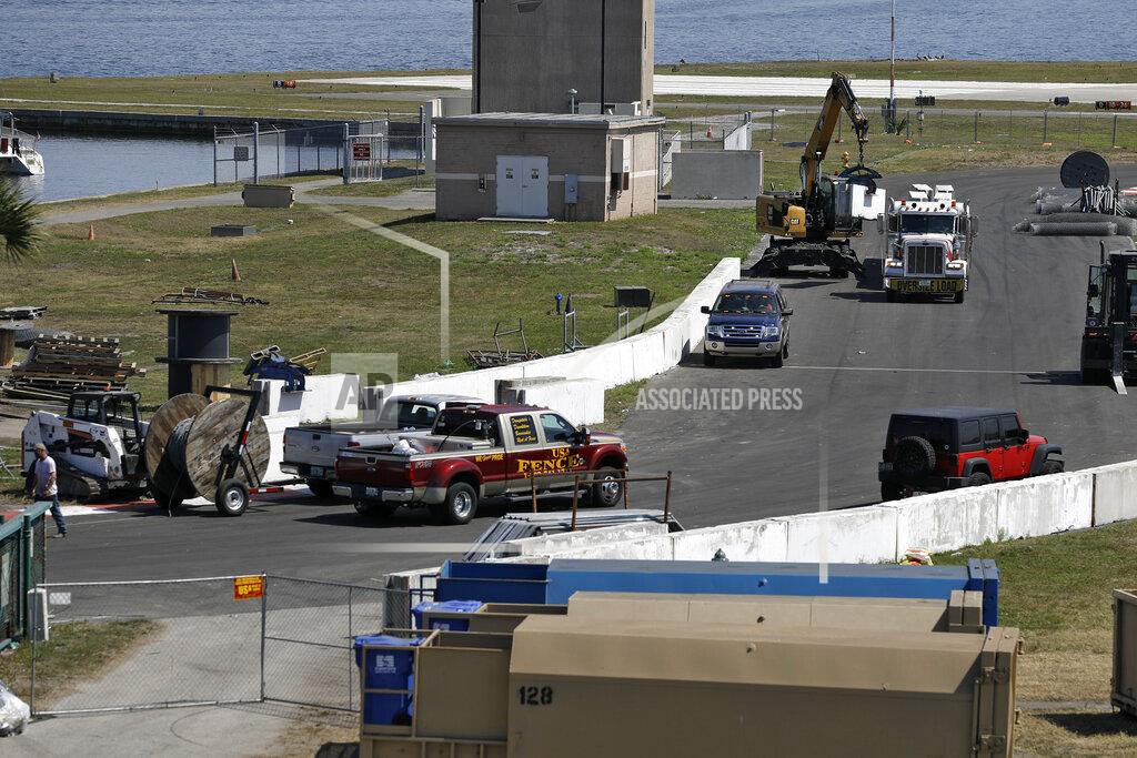 Chris O'meara Worker begin to dismantle the track for the IndyCar Firestone Grand Prix of St. Petersburg, Monday, March 16, 2020, in St. Petersburg, Fla. Race organizers canceled the event to help curb the spread of the coronavirus. (AP Photo/Chris O'Meara)