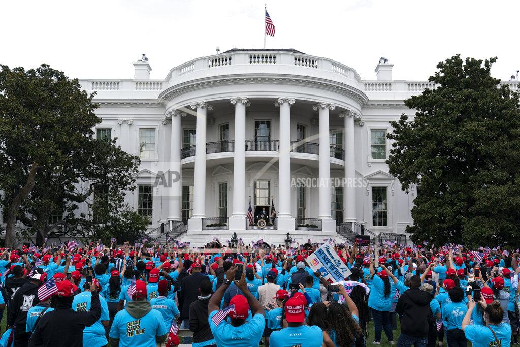 Alex Brandon President Donald Trump speaks from the Blue Room Balcony of the White House to a crowd of supporters, Saturday, Oct. 10, 2020, in Washington. (AP Photo/Alex Brandon)