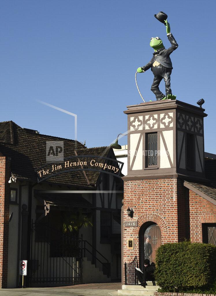 Chris Pizzello A statue of Kermit The Frog stands at the entrance to The Jim Henson Company, Tuesday, July 7, 2020, in the Hollywood section of Los Angeles. The U.S. government's small business lending program sent pandemic relief money into unexpected corners of the entertainment industry. The Muppet makers say they received about $2 million to keep their 75 workers employed through the coronavirus shutdown. (AP Photo/Chris Pizzello)
