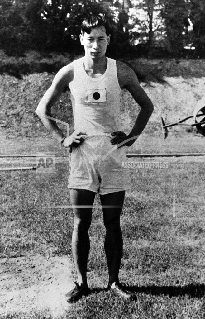 Uncredited FILE - In this Aug. 2, 1928, file photo, Mikio Oda, of Japan, poses after he had won the gold medal in the men's Triple Jump at the Olympic Games in Amsterdam. (AP Photo/File)