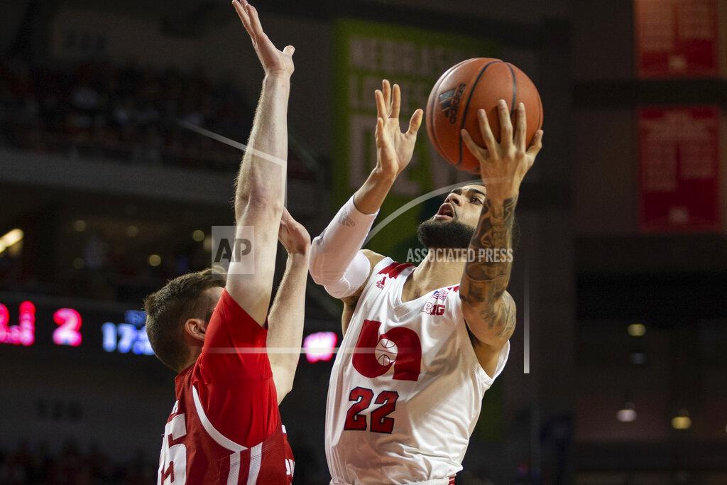 John Peterson Nebraska guard Haanif Cheatham (22) makes a lay up against Wisconsin forward Nate Reuvers (35) during the first half of an NCAA college basketball game in Lincoln, Neb., Saturday, Feb. 15, 2020. (AP Photo/John Peterson)