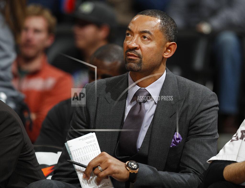 FILE - In this Nov. 30, 2016, file photo, Miami Heat assistant coach Juwan Howard watches during the second half of the team's NBA basketball game against the Denver Nuggets in Denver. A person with knowledge of the situation tells The Associated Press that Howard has agreed to a five-year deal to take over as Michigan men's basketball coach. The person spoke on condition of anonymity Wednesday, May 22, 2019, because the announcement had not been made. (AP Photo/David Zalubowski, File)