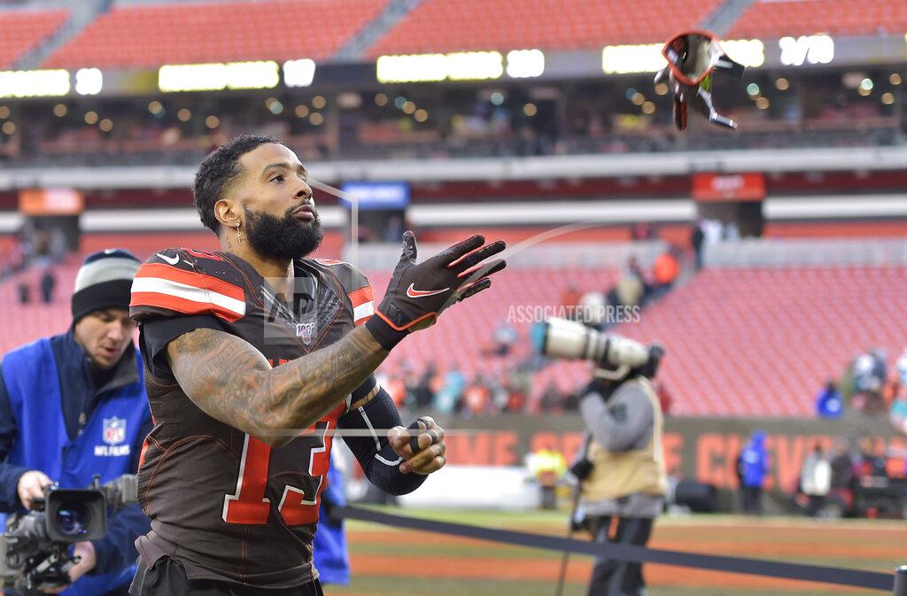 David Richard Cleveland Browns wide receiver Odell Beckham Jr. throws his gloves to a fan after an NFL football game against the Miami Dolphins, Sunday, Nov. 24, 2019, in Cleveland. Cleveland won 41-24. (AP Photo/David Richard)