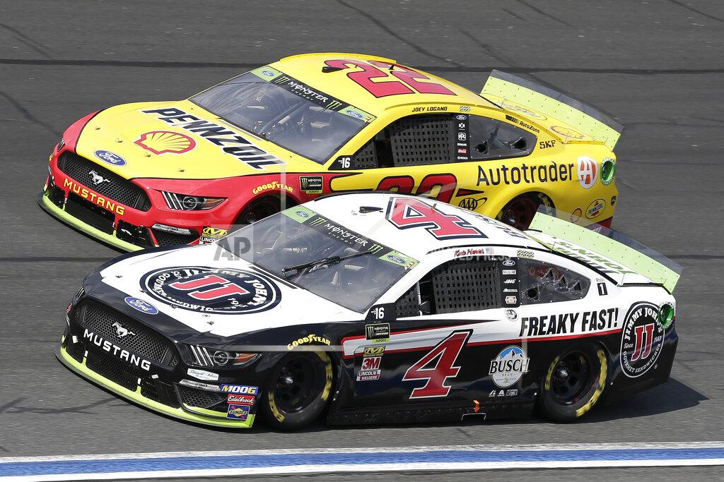 Gerry Broome Kevin Harvick (4) and Joey Logano (22) drive through Turn 4 during a NASCAR Cup Series auto race at Charlotte Motor Speedway in Concord, N.C., Sunday, Sept. 29, 2019. (AP Photo/Gerry Broome)