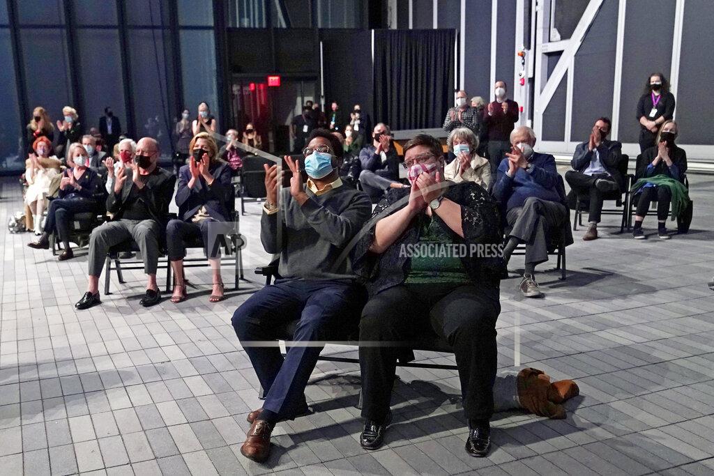 Kathy Willens Members of an audience of 150 people applaud at the conclusion of a concert by the New York Philharmonic, which performed together for the first time since March 10, 2020, at The Shed in Hudson Yards, Wednesday, April 14, 2021, in New York. (AP Photo/Kathy Willens)