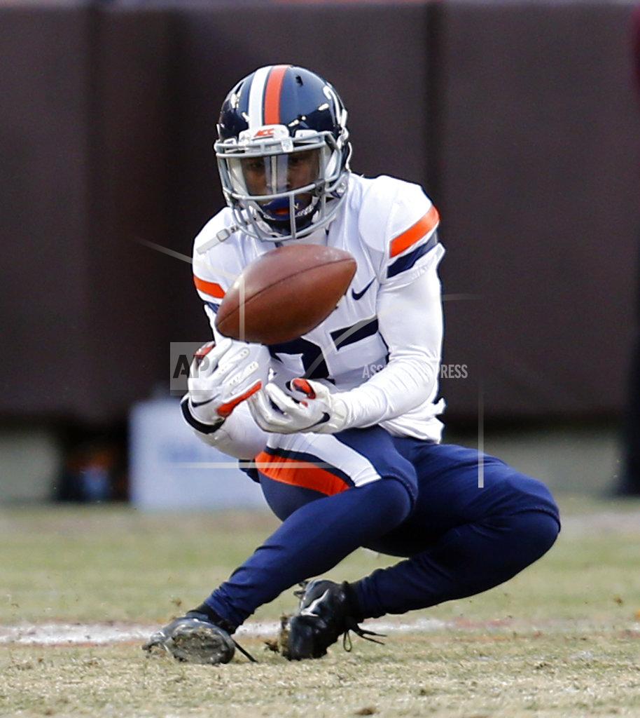 Steve Helber Virginia wide receiver, Tavares Kelly (27) bobbles a pass during the first half of an NCAA college football game against Virginia Tech, in Blacksburg, Va., Friday, Nov. 23, 2018. (AP Photo/Steve Helber)