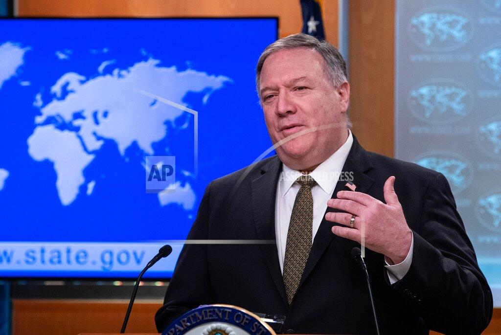 Nicholas Kamm FILE - In this April 22, 2020, file photo, Secretary of State Mike Pompeo speaks during a press briefing at the State Department, in Washington. Pompeo has told his Southeast Asian counterparts that China is taking advantage of the world’s preoccupation with the coronavirus pandemic to push its territorial ambitions in the South China Sea.(Nicholas Kamm/Pool Photo via AP, File)