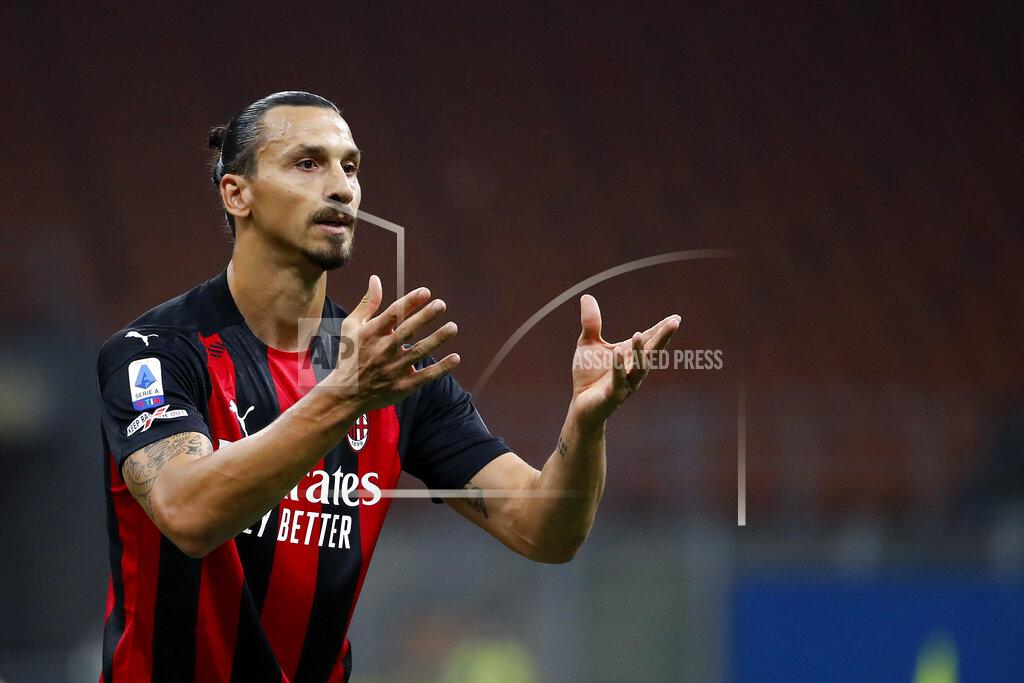 Antonio Calanni FILE - In this Sept. 21, 2020 file photo, AC Milan's Zlatan Ibrahimovic reacts during the Serie A soccer match between AC Milan and Bologna at the San Siro stadium, in Milan, Italy. It will be a strange atmosphere at San Siro when Inter Milan hosts city rival AC Milan on Saturday with only 1,000 fans allowed in because of the coronavirus pandemic. One player who is almost certain to be on the field is Milan forward Zlatan Ibrahimović, who returned to training this week after recovering from the virus. (AP Photo/Antonio Calanni)