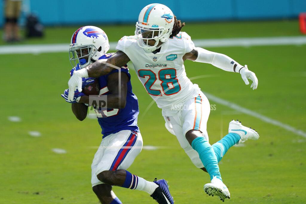 Lynne Sladky Buffalo Bills wide receiver John Brown (15) catches a pass for a touchdown as Miami Dolphins strong safety Bobby McCain (28)defends, bduring the second half of an NFL football game, Sunday, Sept. 20, 2020, in Miami Gardens, Fla. The Bills defeated the Dolphins 31-28. (AP Photo/Lynne Sladky)