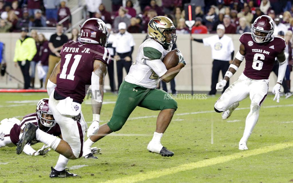 Michael Wyke UAB running back Spencer Brown, center, heads to the end zone, between Texas A&M defensive back Larry Pryor (11) and defensive back Donovan Wilson (6) during the second half of an NCAA college football game Saturday, Nov. 17, 2018, in College Station, Texas. (AP Photo/Michael Wyke)