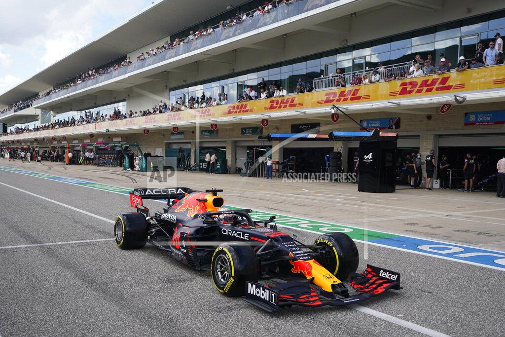 Red Bull driver Max Verstappen, of the Netherlands, leaves the pits during qualifications for the F1 U.S. Grand Prix auto race at the Circuit of the Americas, Saturday, Oct. 23, 2021, in Austin, Texas. (AP Photo/Darron Cummings, Pool)