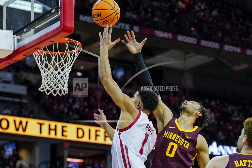 Andy Manis Wisconsin's Johnny Davis (1) shoots against Minnesota's Payton Willis (0) during the second half of an NCAA college basketball game Sunday, Jan. 30, 2022, in Madison, Wis. Wisconsin won 66-60. (AP Photo/Andy Manis)
