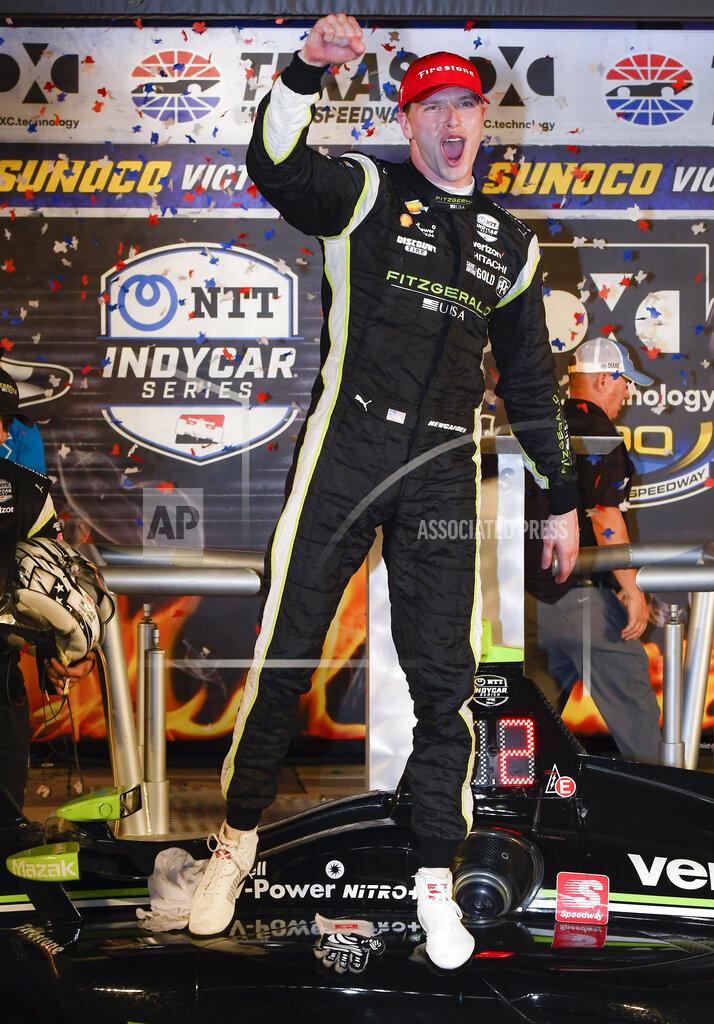 Larry Papke Josef Newgarden celebrates in Victory Lane after winning the IndyCar auto race at Texas Motor Speedway, Saturday, June 8, 2019, in Fort Worth, Texas. (AP Photo/Larry Papke)
