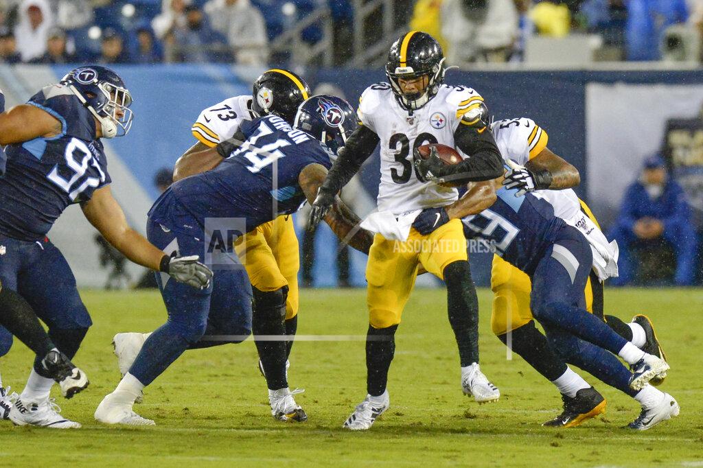 Mark Zaleski Pittsburgh Steelers running back James Conner (30) carries the ball against the Tennessee Titans in the first half of a preseason NFL football game Sunday, Aug. 25, 2019, in Nashville, Tenn. (AP Photo/Mark Zaleski)