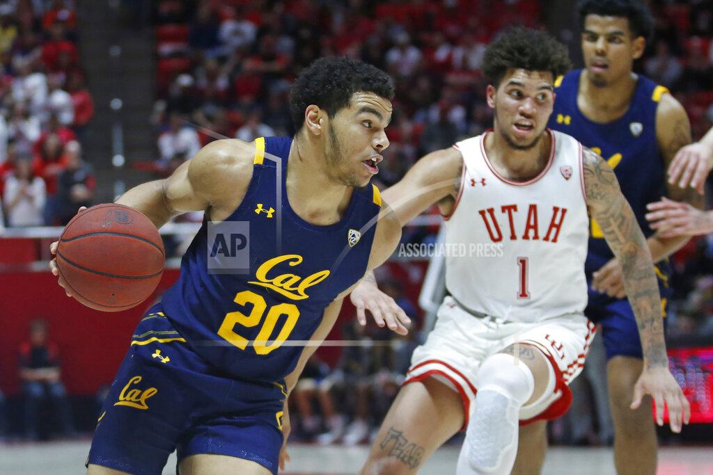 Rick Bowmer California guard Matt Bradley (20) drives around Utah forward Timmy Allen (1) during the first half of an NCAA college basketball game Saturday, Feb. 8, 2020, in Salt Lake City. (AP Photo/Rick Bowmer)