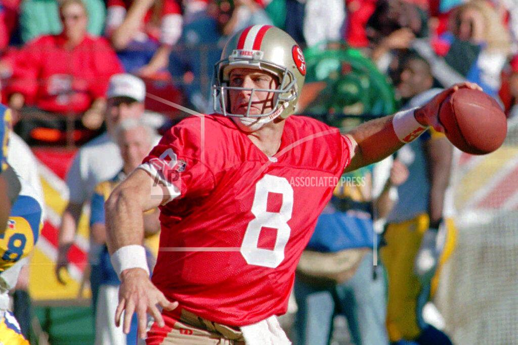 Paul Sakuma FILE - In this Nov. 26, 1995, file photo, San Francisco 49ers quarterback Steve Young throws against the St. Louis Rams in the first half of an NFL football game at San Francisco's 3Com Park. Miami Dolphins rookie Tua Tagovailoa is a rarity in the NFL: a left-handed quarterback. The last lefty to start a game was Kellen Moore in 2015. Hall of Famer Steve Young thinks he has the answer to why so few lefties are left: they're turned into defenders in pee-wee or high school. (AP Photo/Paul Sakuma, File)