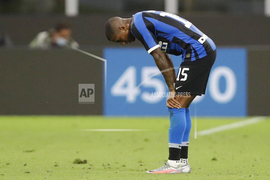 Luca Bruno FILE -- In this July 22, 2020 file photo Inter Milan's Ashley Young gestures end of a Serie A soccer match between Inter Milan and Fiorentina, at the San Siro stadium in Milan, Italy. Ashley Young has tested positive for the coronavirus, becoming the sixth Nerazzurri player to contract the virus in the past week. (AP Photo/Luca Bruno)