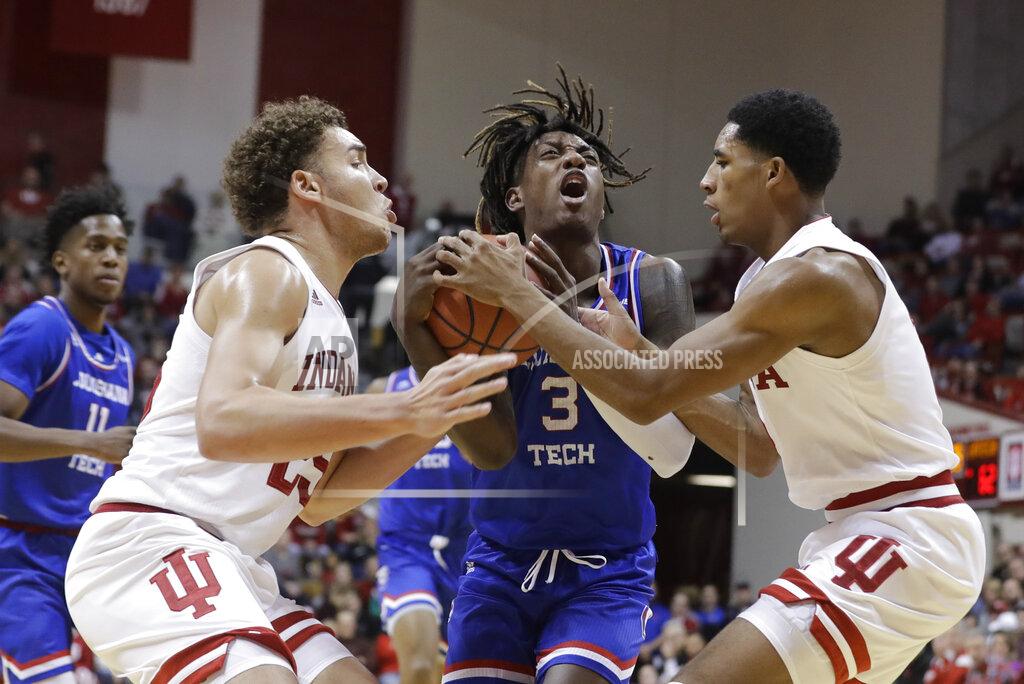 Darron Cummings Louisiana Tech's Amorie Archibald (3) goes to the basket against Indiana's Race Thompson, left, and Armaan Franklin during the second half of an NCAA college basketball game, Monday, Nov. 25, 2019, in Bloomington, Ind. Indiana won 88-75. (AP Photo/Darron Cummings)