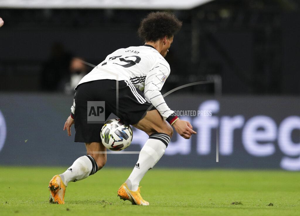 Michael Sohn Germany's Leroy Sane attempts to control the ball during the UEFA Nations League soccer match between Germany and the Ukraine at the Red Bull Arena in Leipzig, Germany, Saturday, Nov. 14, 2020. (AP Photo/Michael Sohn)