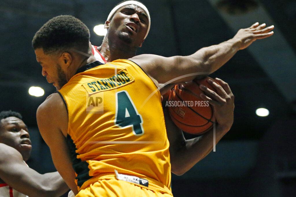 Rogelio V. Solis Mississippi guard Blake Hinson, right, and Southeastern Louisiana forward Maxwell Starwood (4) collide while going for a rebound during the second half of an NCAA college basketball game, Saturday, Dec. 21, 2019, in Jackson, Miss. (AP Photo/Rogelio V. Solis)