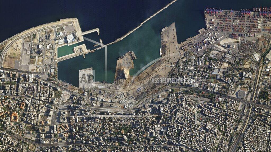 Uncredited This satellite image taken on Wednesday Aug. 5, 2020 shows the port of Beirut and the surrounding area in Lebanon following a massive explosion on Tuesday. Residents of Beirut confronted a scene of utter devastation a day after a massive explosion at the port rippled across the Lebanese capital, killing at least 100 people, wounding thousands and leaving entire city blocks blanketed with glass and rubble. (Planet Labs Inc. via AP)