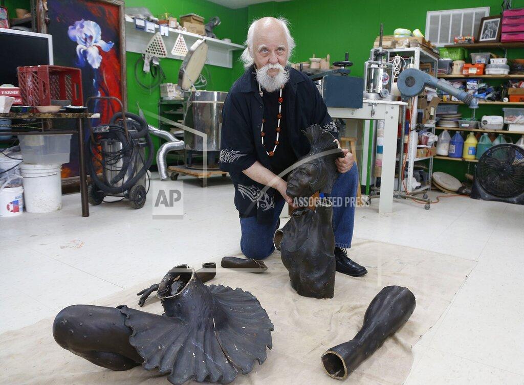 Stephen Pingry Sculptor Gary Henson, who made the Marjorie Tallchief statue that was stolen from the Tulsa Historical Society and cutup for scrap metal, shows the parts which he will reassemble at the Boys and Girls Club in Chelsea, Okla., on Monday, May 9, 2022. (Stephen Pingry/Tulsa World via AP)