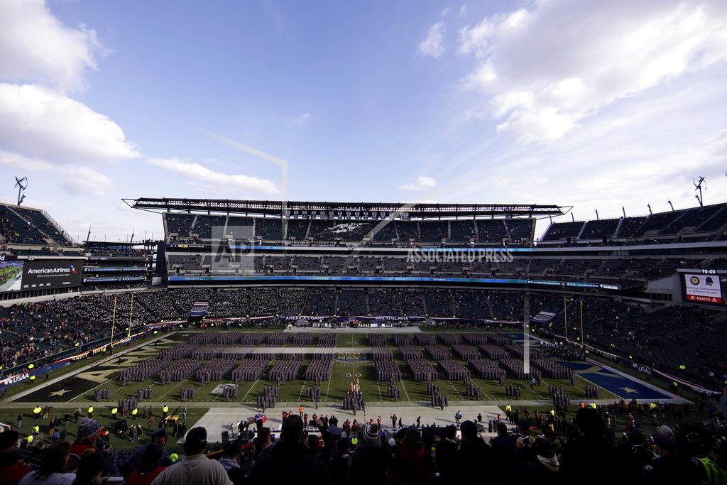 Matt Slocum Army Cadets stand at attention after marching onto the field before an NCAA college football game against Navy, Saturday, Dec. 8, 2018, in Philadelphia. (AP Photo/Matt Slocum)