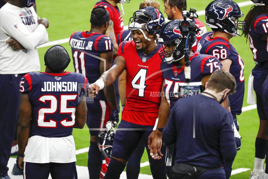 Brett Coomer Houston Texans quarterback Deshaun Watson (4) laughs with running back Duke Johnson (25) on the sidelines during NFL football training camp Thursday, Aug. 27, 2020, in Houston. (Brett Coomer/Houston Chronicle via AP, Pool)