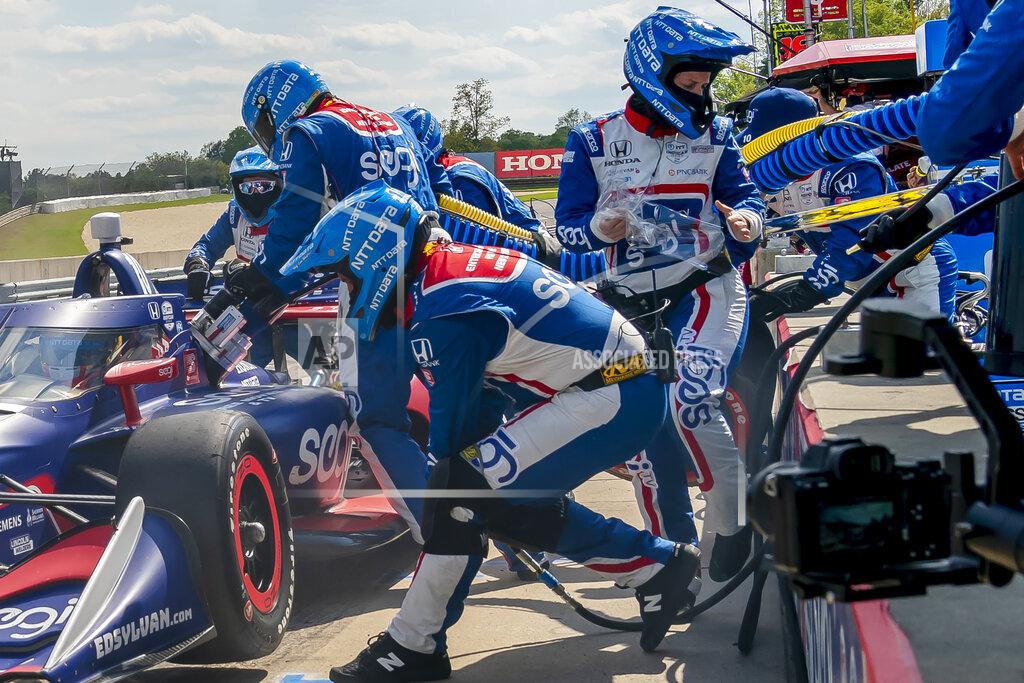 Walter G Arce Sr In this photo provided by Chip Ganassi Racing, Danielle Shepherd, at right with the clear sheet in her hand, works in the pit for auto racing driver Alex Palou during the Honda Indy Grand Prix of Alabama auto race at Barber Motorsports Park., Sunday, April 18, 2021, in Birmingham, Ala. Shepherd went over the wall when tasked with removing the tear off from the aeroscreen on Palou's car. The last three IndyCar races have been won by drivers who have female engineers on their teams, a trend that could continue Sunday at Mid-Ohio Sports Car Course. (Walter G. Arce/Chip Ganassi Racing via AP)