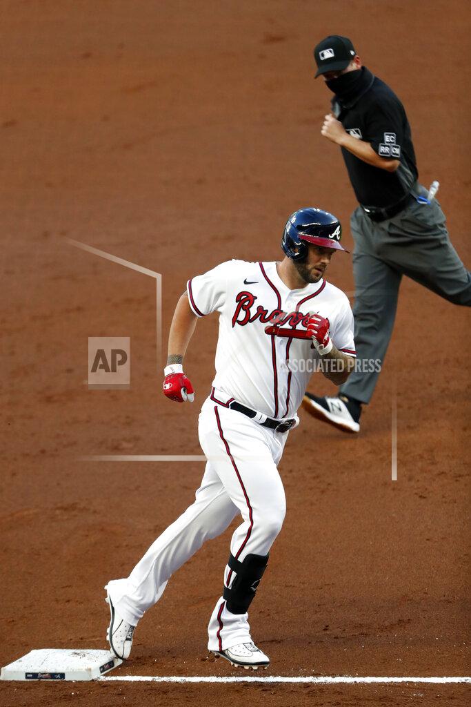 John Bazemore Atlanta Braves' Matt Adams (18) rounds third base after hitting a home run in the second inning of a baseball game against the Toronto Blue Jays Tuesday, Aug. 4, 2020, in Atlanta. (AP Photo/John Bazemore)