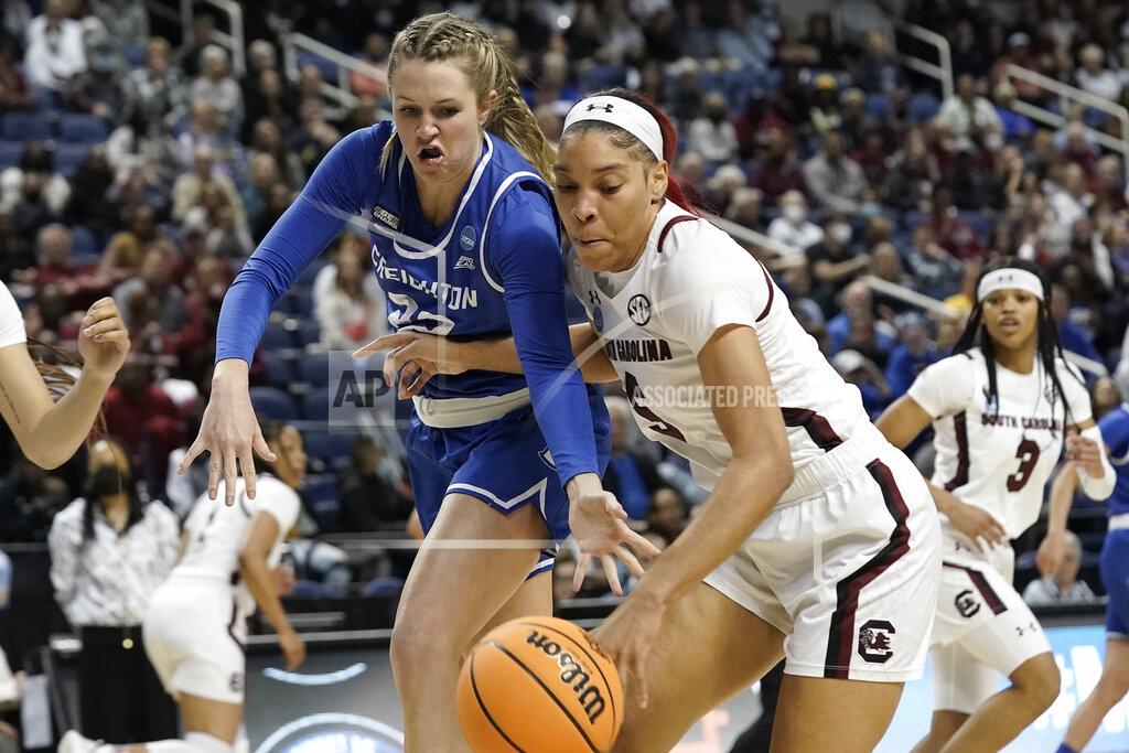 Gerry Broome Creighton guard Carly Bachelor, left, defends against South Carolina forward Victaria Saxton (5) during the first half of a college basketball game in the Elite 8 round of the NCAA tournament in Greensboro, N.C., Sunday, March 27, 2022. (AP Photo/Gerry Broome)